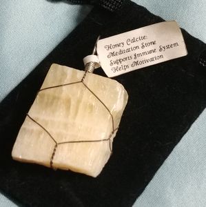 π With $25 Dollar Purchase! Honey calcite stone (wire wrapped)